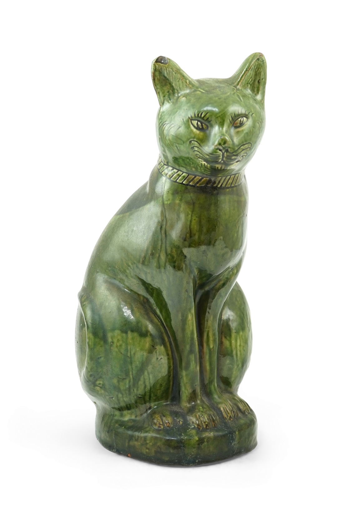 Ewenny Pottery: A large green-glazed figure of a seated cat